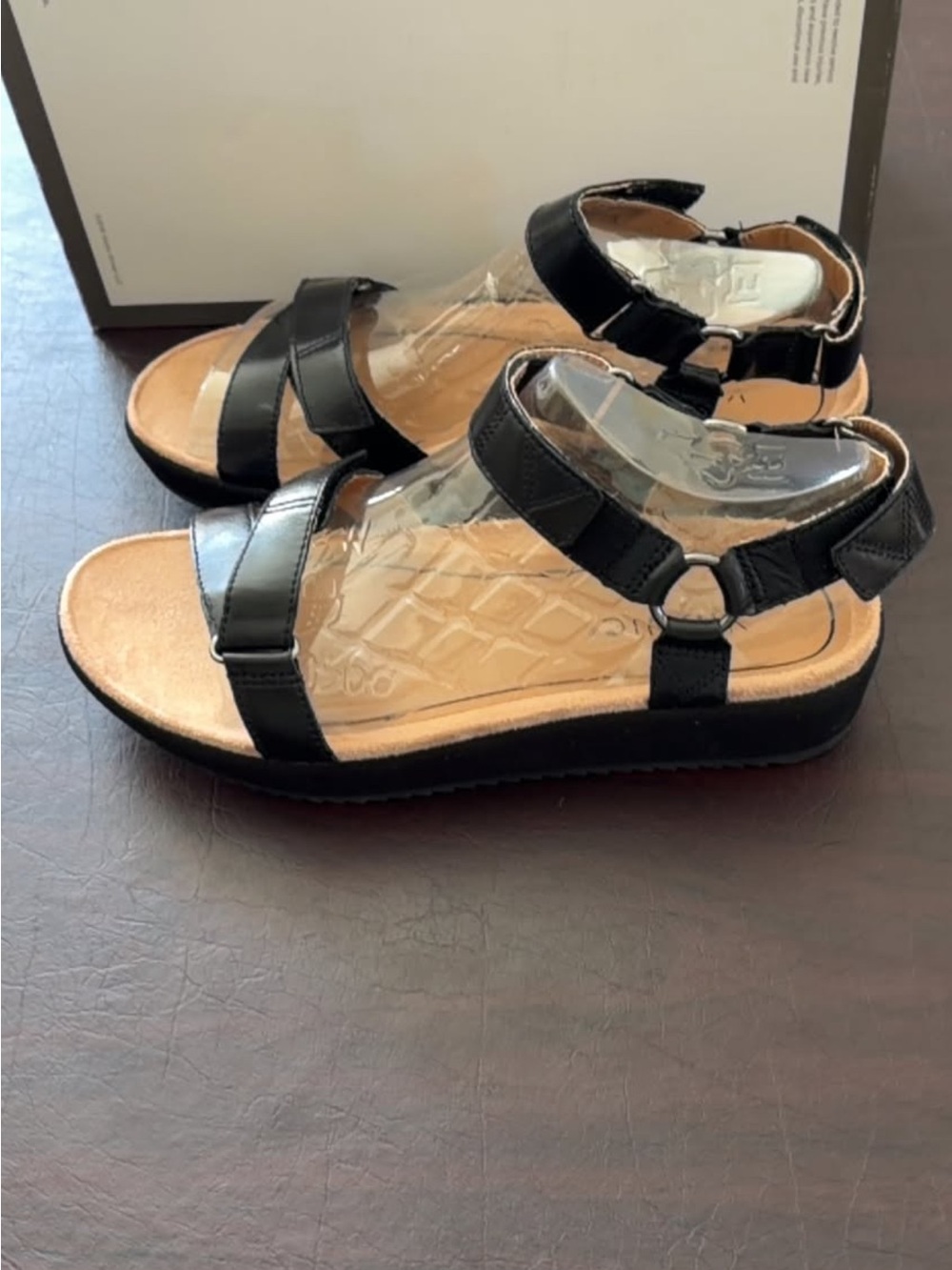 New in box Vionic Black Leather Strappy Sandals with Tan Footbed